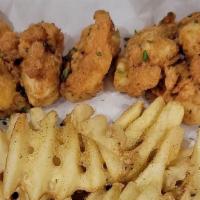 Fried Shrimp + Fries · Seasoned fried golden shrimp