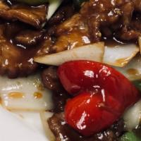Pepper Steak · Sautéed beef, green peppers and onions in brown sauce.