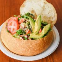 Bikini Salad · Fresh spinach, avocado, red onions, tomatoes, alfalfa sprouts & gouda cheese, choice of dres...