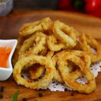 Fried Calamari · Lightly battered and deep fried, served with sweet chili sauce.