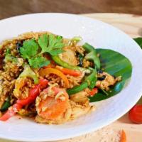 Basil Fried Rice · Spicy. White rice stir-fried with basil leaves, onions, bell peppers, and carrots.