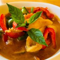 Panang Curry · Panang curry paste in coconut milk with bell pepper and lime leaves. Spicy.
