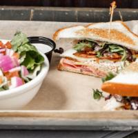 Stratford Club · Boar's Head turkey and ham, bacon, Swiss and American cheese, lettuce, tomato, mayo, and oni...