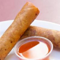 Pork Egg Roll · Pork, shredded carrots, onions and cabbage and wrapped in wheat paper served with traditiona...