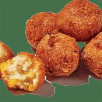 New! Hushpuppies · Our Southern take on a classic favorite, these hushpuppies have just the right balance of sw...