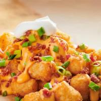 Loaded French Fries · French Fries topped with melted Mozzarella cheese, bacon and jalapeño.