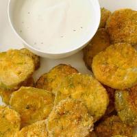 Fried Pickles · Deep fried battered Pickle chips served with ranch dipping sauce.