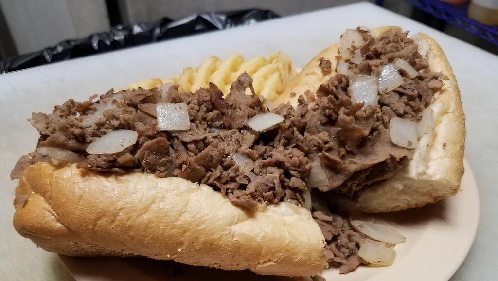 Philly Cheese Steak · Steak american cheese sauteed onions.