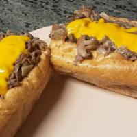 The Big Cheesee · Steak, American Cheese, Provolone Cheese, Mozzarella Cheese Finished with a channel on top o...