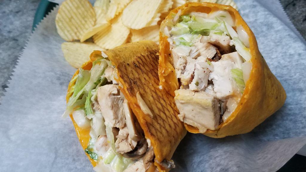 Blackened Chicken Wrap · Grilled chicken blackened with chef paul prudhommes seasoning wrapped with cheddar jack cheese, lettuce and tomatoes..