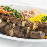 Beef Kabbob · 2 selected ribeye skewers marinated with our own spices and cooked on char-broil.