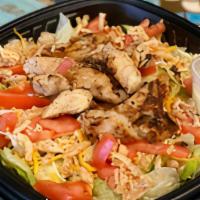 House Salad · New. Romaine and iceberg lettuce, Colby jack cheese, tomatoes, cucumbers, crispy onions. Top...