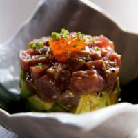 Tuna Tataki · Thinly sliced ahi tuna with ponzu sauce.