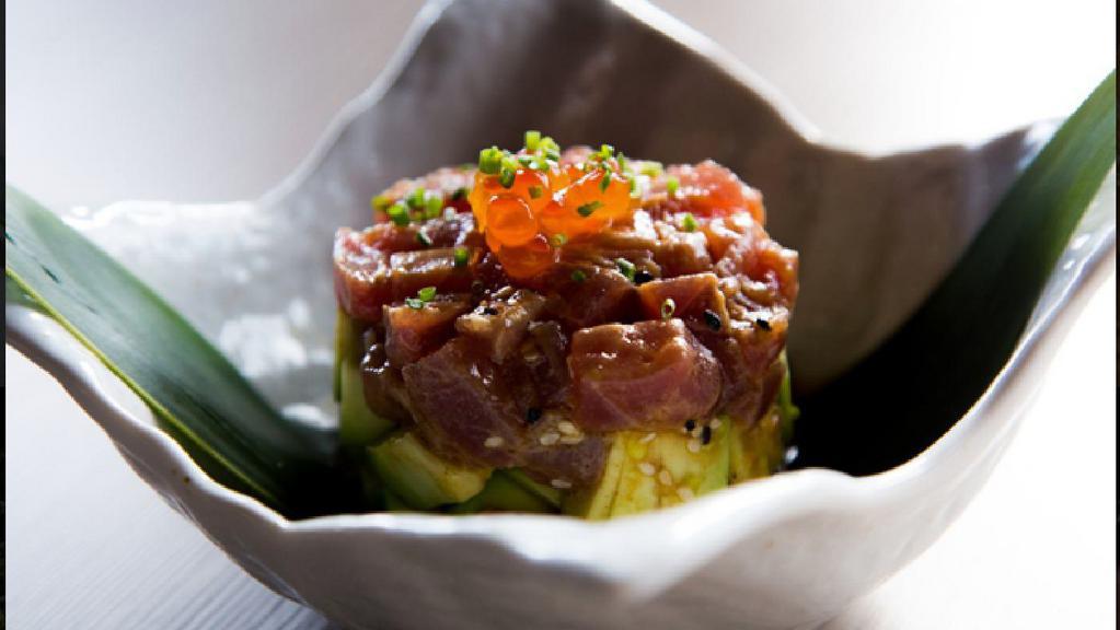 Tuna Tataki · Thinly sliced ahi tuna with ponzu sauce.