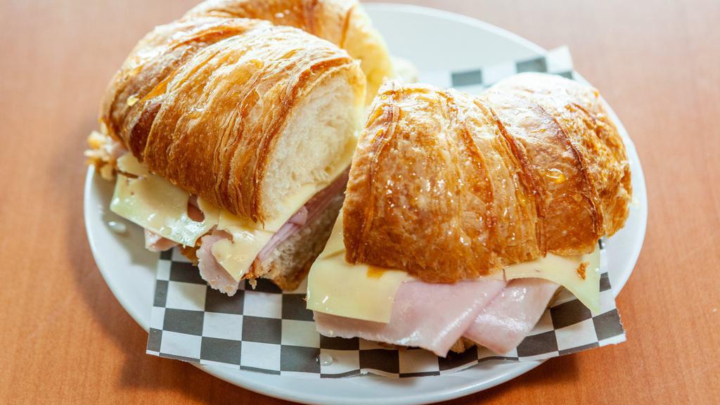 35 - Croissant Ham & Cheese · A Toasted Croissant with Ham and Cheese