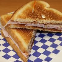10 - Caliente · Ham and Cheese Sandwich on Enriched Bread with Mayonnaise