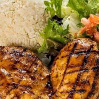 Pollo Al Grill · Marinated wood grilled chicken breast 10 oz. Served with white rice, beans, and salad.