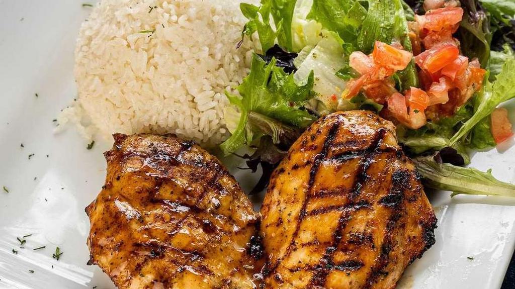 Pollo Al Grill · Marinated wood grilled chicken breast 10 oz. Served with white rice, beans, and salad.