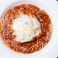 Homemade Lasagna · Baked to perfection, topped with mozzarella cheese, and meat sauce. Served with hot pamendis...