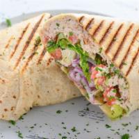 Tuna Salad · Our homemade tuna salad with lettuce, tomatoes and onions.
