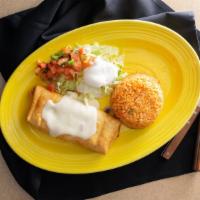 Chimichanga · A large flour tortilla stuffed with beef or chicken, refried beans then wrapped and fried to...