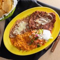 Carne Asada · 8 oz skirt steak topped with grilled onions. Served with rice, beans, pico de gallo, lettuce...