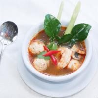 Tom Yum Soup · Mild spicy, contain shellfish, gluten-free. Thai style hot and sour soup with mushrooms, lem...
