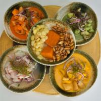 Cuarentena · Four-flavored ceviche sampler.

consuming raw or undercooked meats, poultry, seafood, shellf...