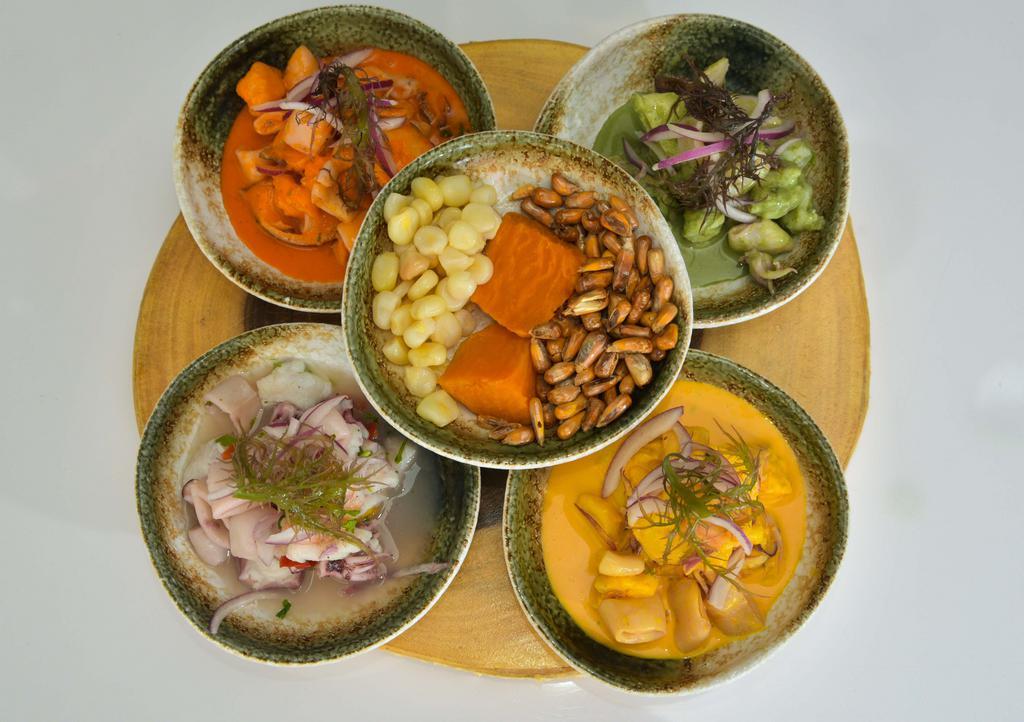 Cuarentena · Four-flavored ceviche sampler.

consuming raw or undercooked meats, poultry, seafood, shellfish or eggs may
increase your risk of foodborne illness, especially if you have certain medical
conditions
