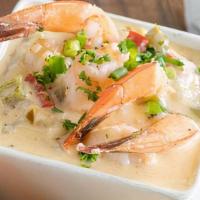 1/2 Shrimp N Grits · Half order of shrimp n grits with a honey buttered biscuit. Garnished with parsley and green...