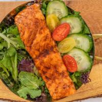 Balsamic Salmon Salad · Grilled salmon filet over lettuce with finely cut onions, celery, almonds and apples with a ...