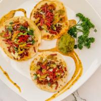 Tres Tacos · 3 Meatless ground Tacos, with crispy onions, crispy jalapeno, mixed greens, and follow your ...