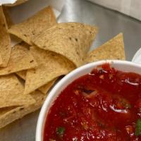 Chips & Salsa · Homemade roasted tomato salsa, served with chips