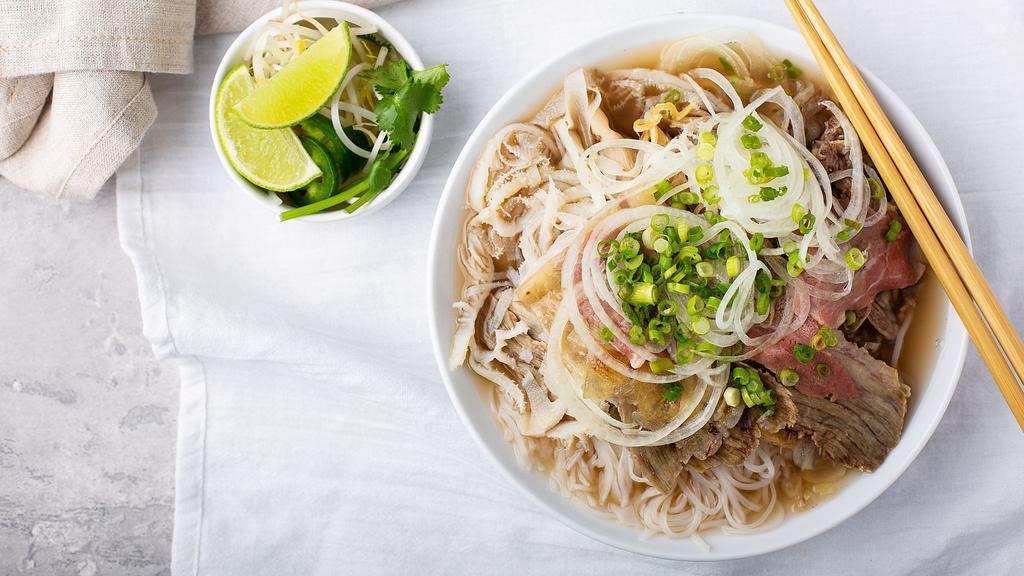 Combo Pho Dac Biet · Most Popular. Rare steak, wd flank, wd brisket, beef tendon, fatty brisket, tripe, onions, chives, beef broth and rice noodles.