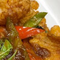 Spicy Crispy Catfish · Boneless catfish filets fried to a succulent tenderness then served with chili garlic sauce