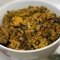 Egusi Soup · melon seeds made with stockfish,crayfish and finely chopped greens served with beef/assorted...