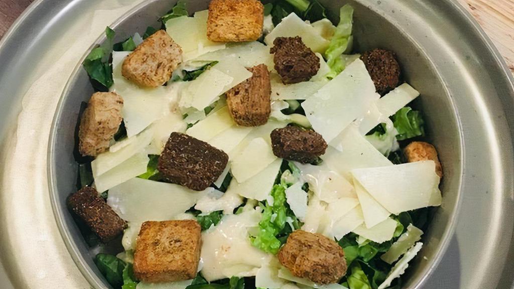 Caesar Salad · romaine lettuce, croutons and shaved parmesan, with caesar dressing