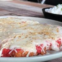 Chicken Parmegiana · chicken strips topped with marinara sauce and melted mozzarella. Served with rice