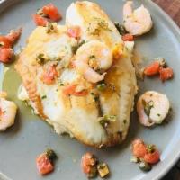 Tilapia And Mashpotato · Grilled fish with shrimps, tomatoes, and capers sauce; and mashed potatoes
