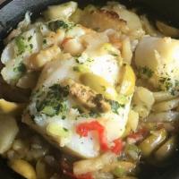 Bacalhau Do Chefe (Serves 1) · codfish, potatoes, onions, tomato, red pepper, garlic, olives and rice