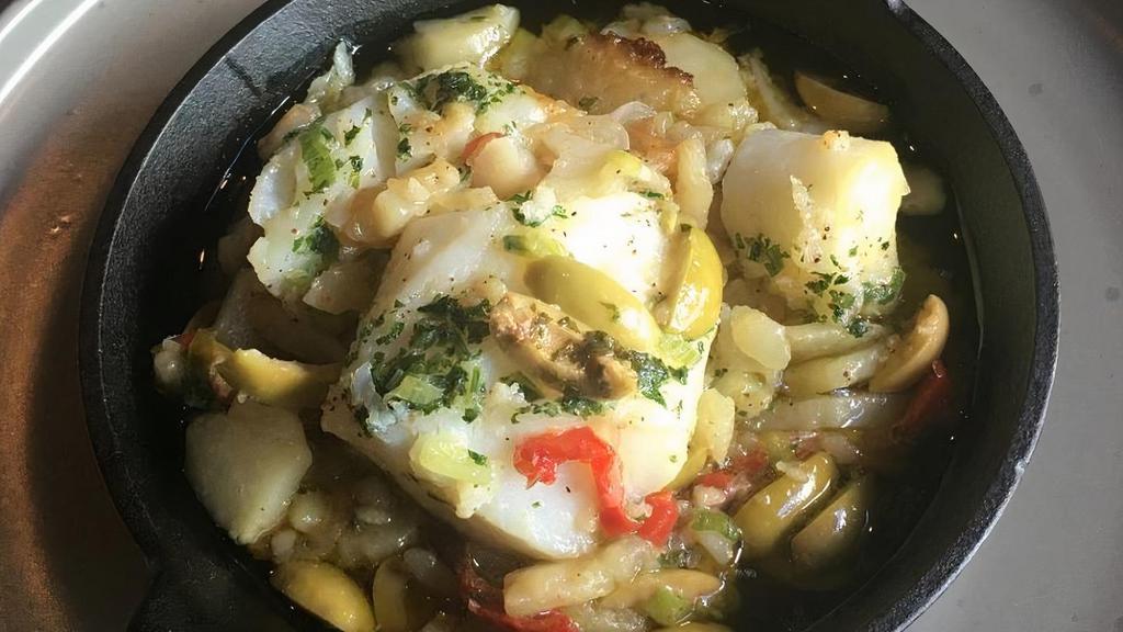 Bacalhau Do Chefe (Serves 1) · codfish, potatoes, onions, tomato, red pepper, garlic, olives and rice