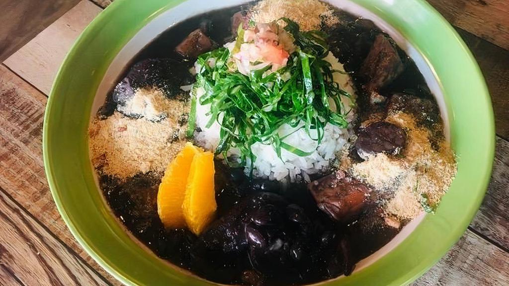 Feijoada For 1 (Only Saturday) · Brazilian traditional dish. Black bean stew with dried beef, pork loin, smoked pork, bacon, sausage and ribs. Served with stir fry collard green, sliced orange, rice and toasted yuca flour