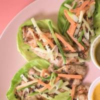 Chick'Let · CHICK'LET=CHICKEN LETTUCE WRAPS. BUTTER LETTUCE, CUCUMBER, SHAVED CARROTS, SCALLIONS, AND GR...