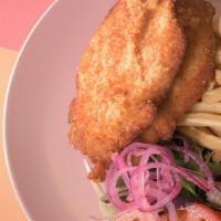Schnitzel Box · two pieces of crispy schnitzel, served with french fries and house salad.