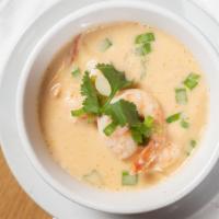 #T28. Tom Kha Gai · Chicken coconut soup. Tom kha: an authentic variation of tom yum. The broth is enhanced with...