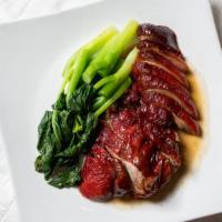Roast Duck · A signature of Siam house. Our famous roast duck, served with chinese broccoli and topped wi...