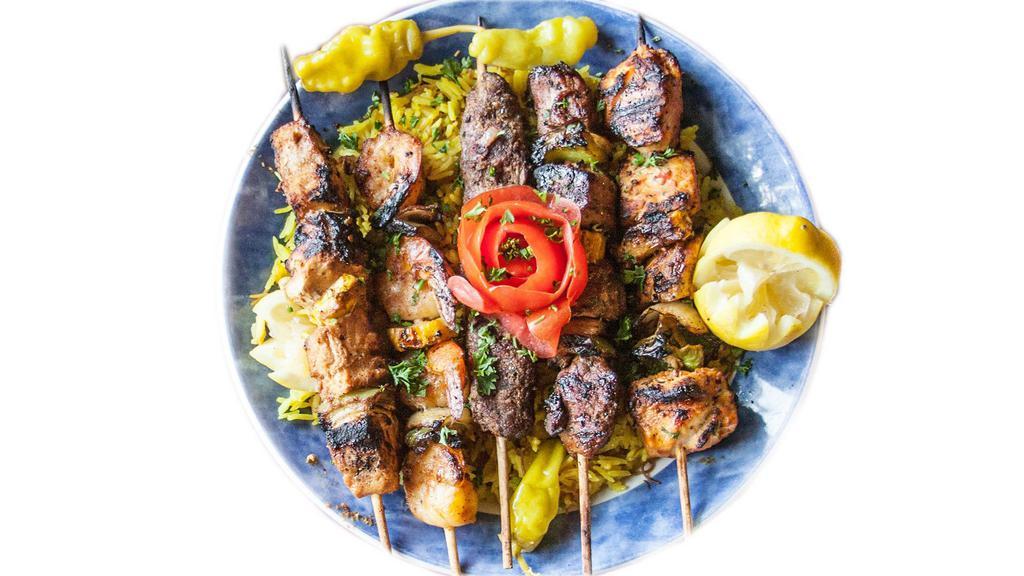 Sultan'S Feast · One each of our five protein kababs:
Lamb, Chicken, Kafta, Swordfish and Shrimp