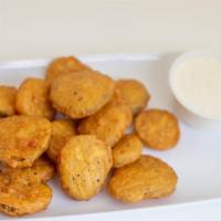 Fried Pickles · New. Crispy, fried pickle chips served with ranch.