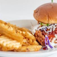 Spicy Korean Chicken Sandwich · New. Hand-battered chicken breast tossed in a gochujang sauce atop cucumbers and cabbage on ...