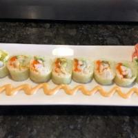 Bahamian Roll · Conch, shrimp, avocado, and masago wrapped with soy paper. Served with kimchee sauce.